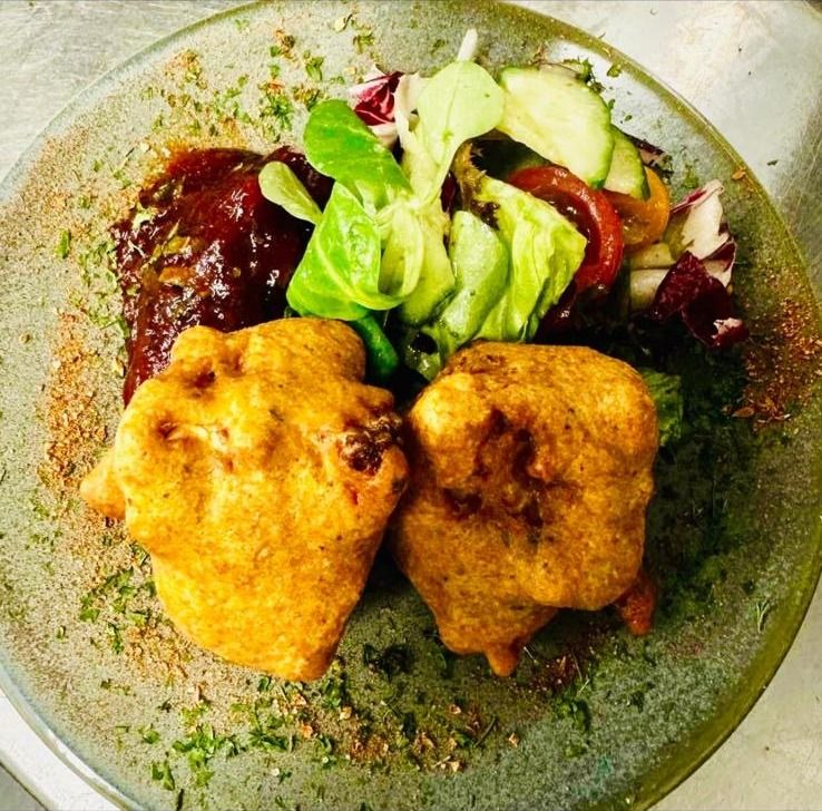 Golden battered fritters with fresh side salad