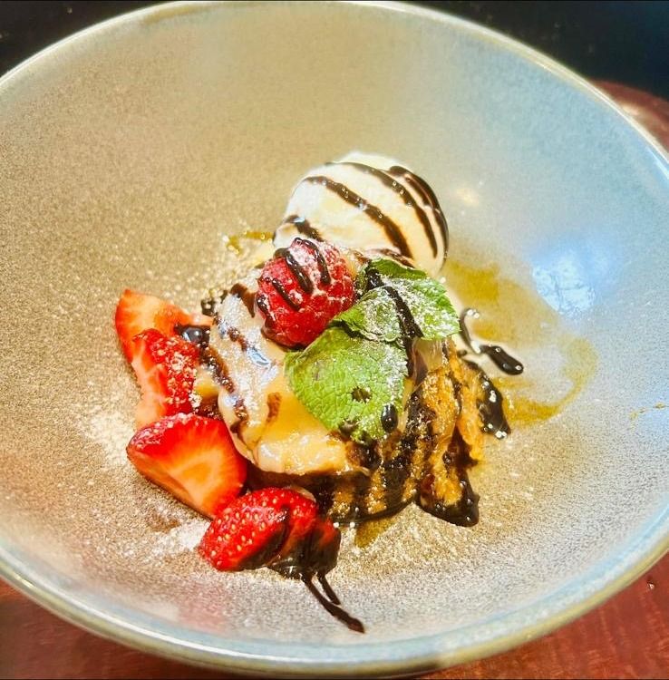 Dessert served with ice cream at The Castle Tavern